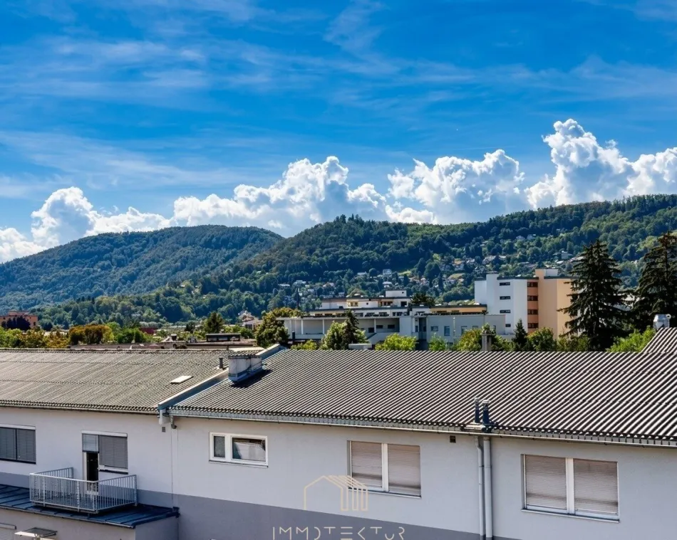 FERNBLICK IN EGGENBERG: Helle 3-Zimmer-Wohnung mit Extraküche, Loggia & Tiefgaragenparkplatz - Bild