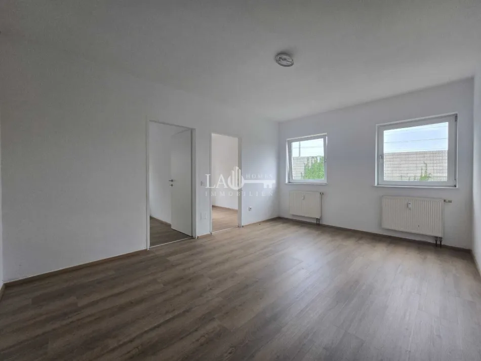 Charmante 4-Zi-Wohnung mit Balkon und Parkplatz - Titelbild