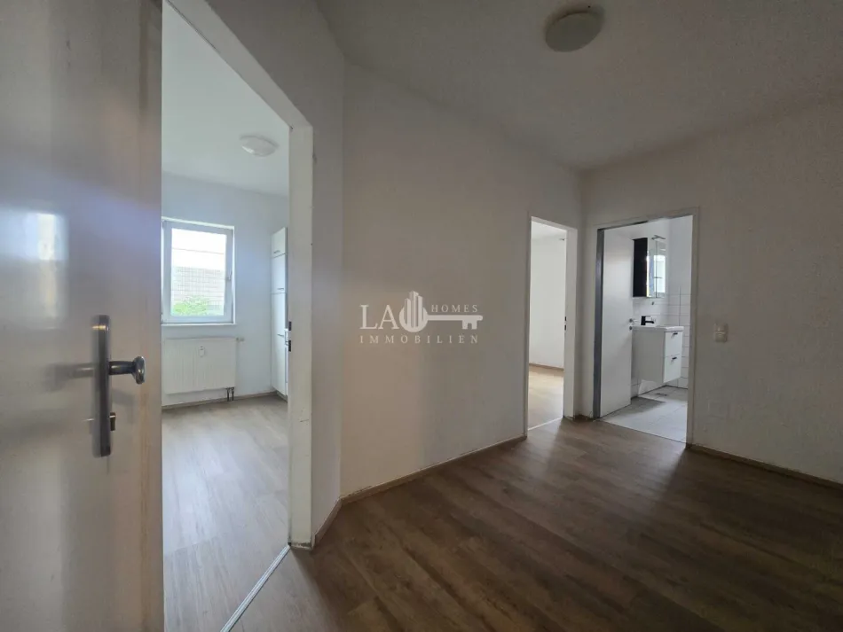 Charmante 4-Zi-Wohnung mit Balkon und Parkplatz - Bild