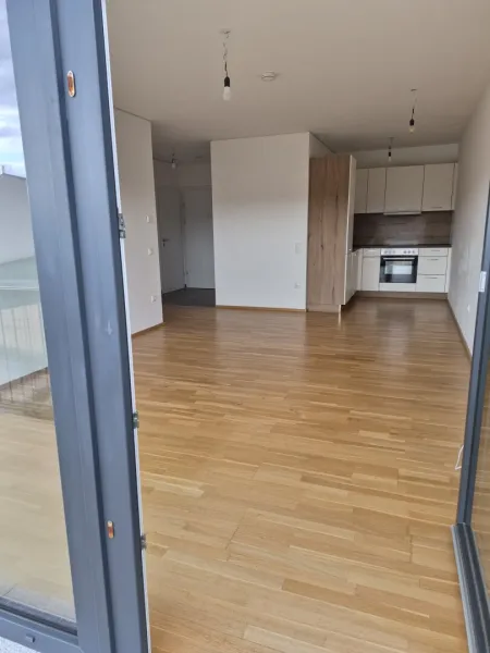 Neubau: 54 m² Wohnkomfort mit sonnigem Balkon in bester Lage
