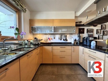 K3 - Exklusiv und großzügig wohnen - nur wenige Minuten vom Wallersee entfernt! Eckreihenhaus mit Wintergarten in herrlicher Ruhelage!