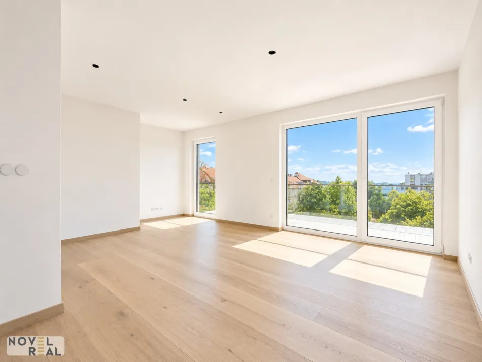 NEU | Exklusive Preisaktion | Großzügige DG-Wohnung mit zwei Balkonen und Parkblick! | Bestlage Schlingermarkt / SCN - Bild