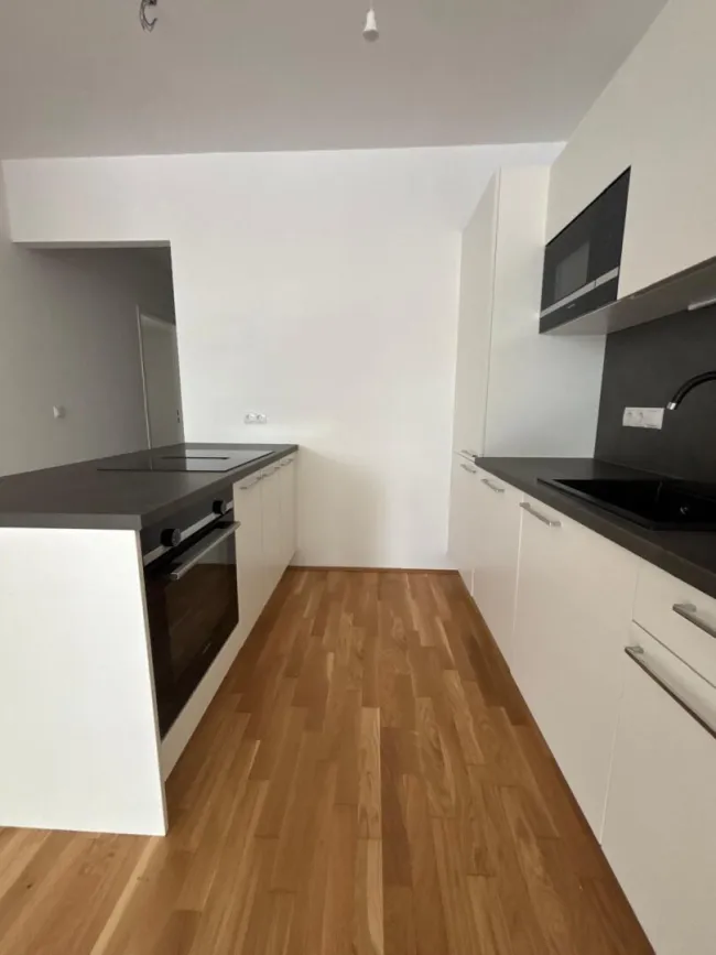 Neuwertige 3-Zi-Wohnung mit Balkon, Fußbodenheizung & Aufzug in Graz 8041 zu mieten! - Bild