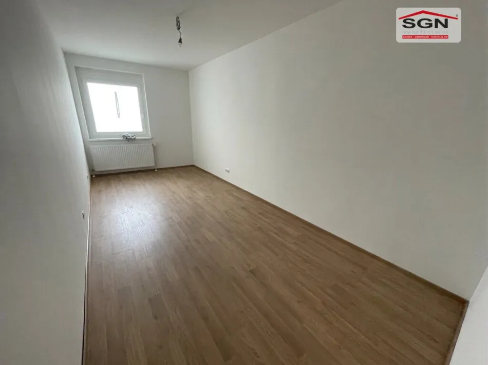 2-Zimmer-EG-Genossenschaftswohnung mit Balkon & Garage - Titelbild