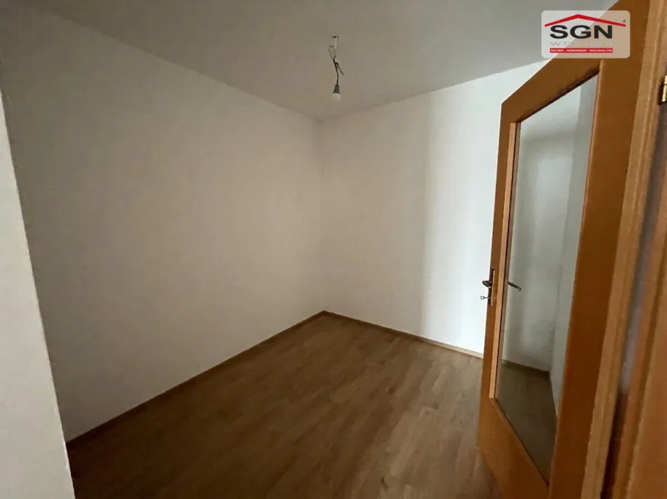2-Zimmer-EG-Genossenschaftswohnung mit Balkon & Garage - Bild