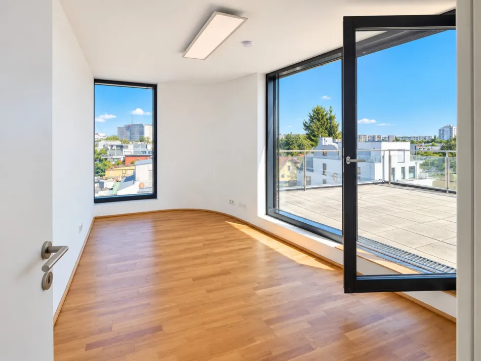 Exklusive 3-Zimmer-Dachgeschosswohnung mit großzügiger Terrasse & Weitblick - Bild
