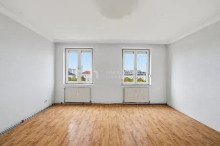 Wohnzimmer mit Blick über die Dächer