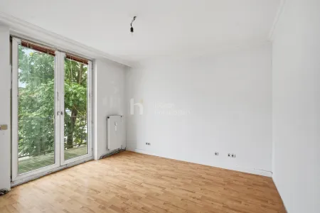 Schlafzimmer mit Balkonzugang