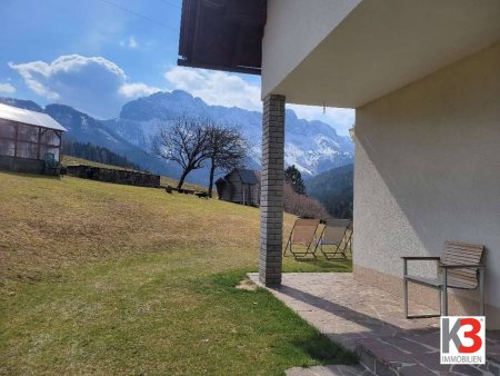 K3 - EINMALIG! TRAUMHAFTES WOHNHAUS MIT UNVERBAUBAREM ALPENPANORAMA. Familienoase in einmaliger Naturlage. Sonnig und nebelfrei.