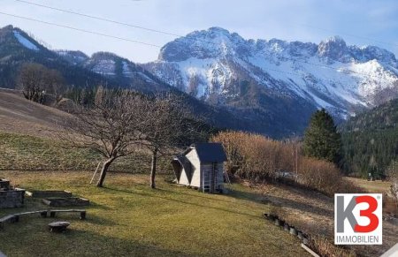 K3 - EINMALIG! TRAUMHAFTES WOHNHAUS MIT UNVERBAUBAREM ALPENPANORAMA. Familienoase in einmaliger Naturlage. Sonnig und nebelfrei.