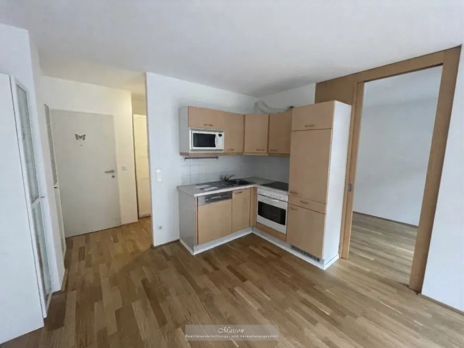 ANLEGERHIT - FREI VERMIETBARE 2-ZIMMER WOHNUNG MIT GARTENTERRASSE UND GARAGE IN HOFRUHELAGE - Bild