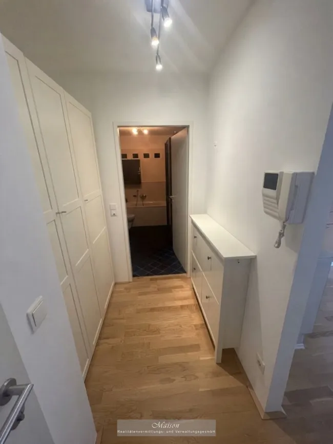 ANLEGERHIT - FREI VERMIETBARE 2-ZIMMER WOHNUNG MIT GARTENTERRASSE UND GARAGE IN HOFRUHELAGE - Bild