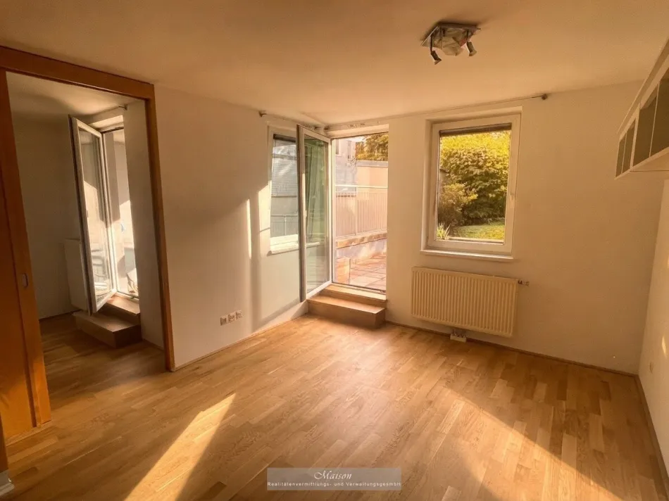 ANLEGERHIT - FREI VERMIETBARE 2-ZIMMER WOHNUNG MIT GARTENTERRASSE UND GARAGE IN HOFRUHELAGE - Titelbild