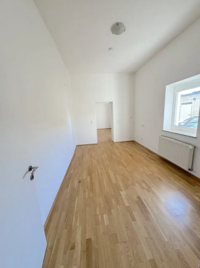 2-Zimmer Wohnung im Erdgeschoss direkt am Hauptplatz! - Titelbild