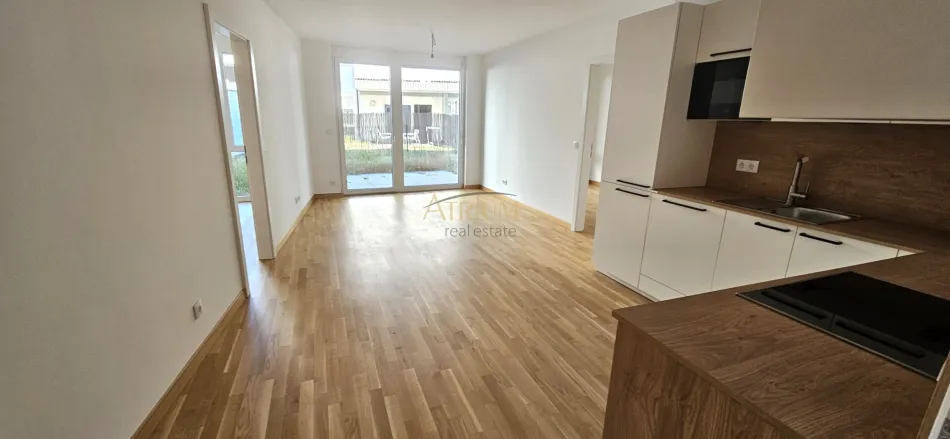 Erstbezug 3-Zi Gartenwohnung mit Terrasse, Fußbodenheizung & Einbauküche in 1220 Wien! - Titelbild