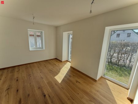 Lichtdurchflutete Erstbezugswohnung mit Garten!