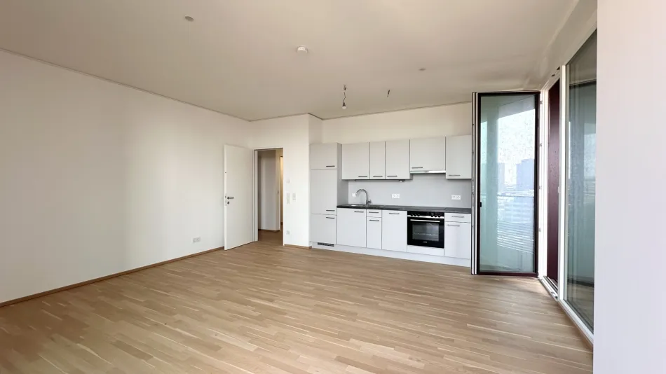 TRIIIPLE | 52,71 m² + 20,08 m² Südwestbalkon | nie bewohnt | 12. Stock - Bild
