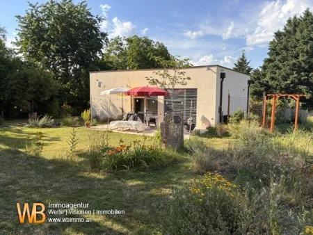 Smarter Neubau 2024 mit schönem Kräutergarten - Titelbild