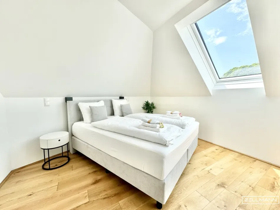 Stilvolle Dachgeschossresidenz mit hochwertiger Ausstattung und urbanem Wohnkomfort | ZELLMANN IMMOBILIEN - Bild