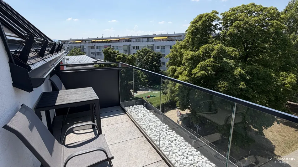Stilvolle Dachgeschossresidenz mit hochwertiger Ausstattung und urbanem Wohnkomfort | ZELLMANN IMMOBILIEN - Titelbild