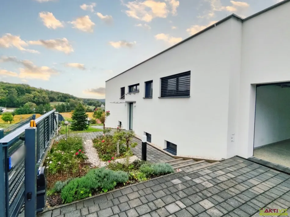 Individuelle Architektenvilla mit Traumküche und großem Grundstück in Aussichtslage im Südburgenland. - Titelbild