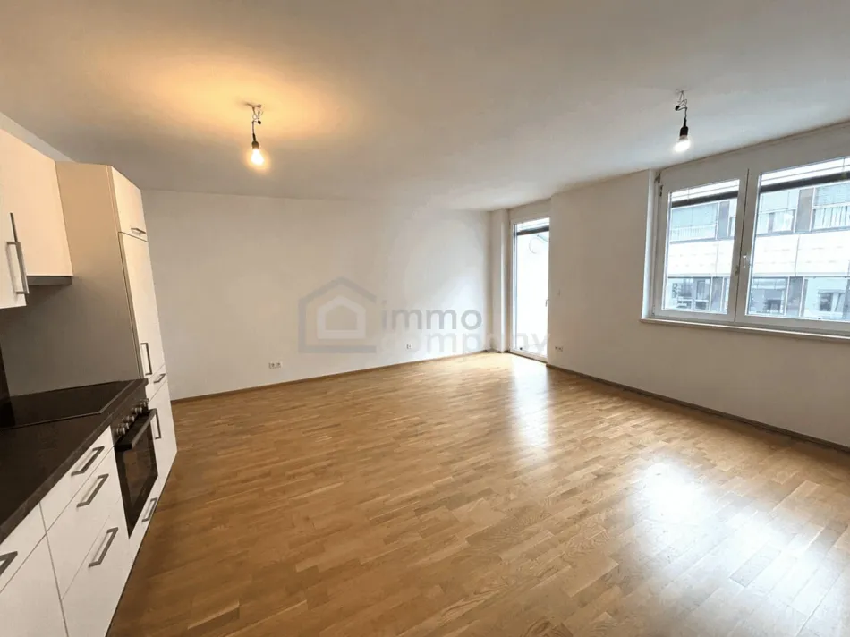 Neuwertige 2-Zi Wohnung in 1100 Wien mit Balkon, Garage Stellplatz & Fußbodenheizung! - Titelbild