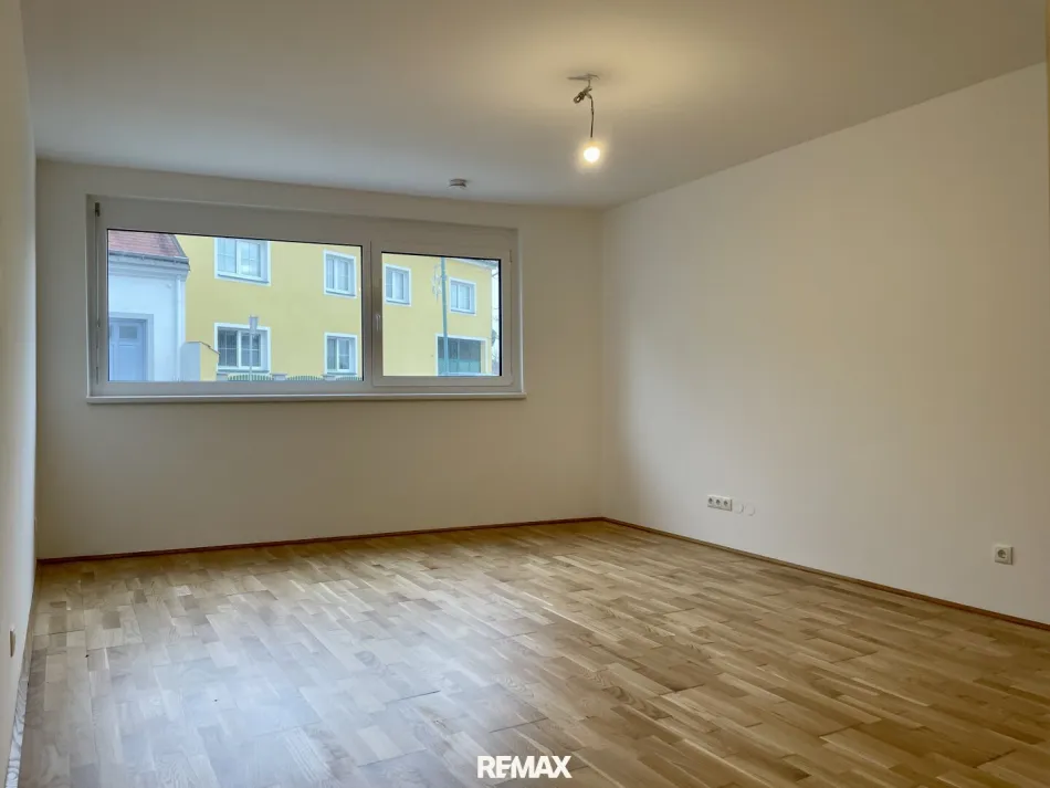 Bergluft - Helle 1-Zimmer-Wohnung mit Garagenparkplatz in Winzendorf zu kaufen! - Bild