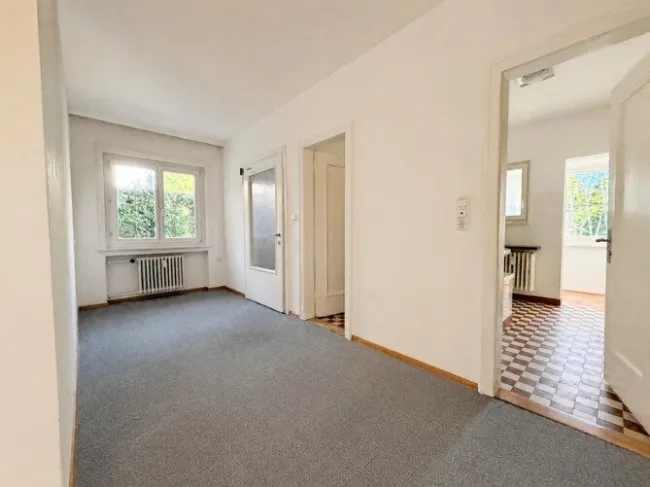 Inspirierende 4,5 Zimmer Altbauwohnung mit Garage, Garten und Balkon - Bild