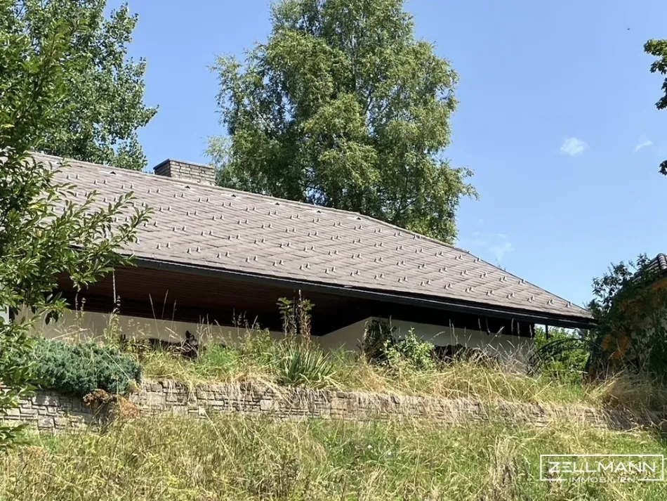 Charmanter Bungalow mit Bergblick in St. Andrä – 4 Zimmer, sanierungsbedürftig | ZELLMANN IMMOBILIEN - Bild