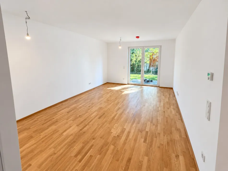 Lichtdurchflutete Gartenwohnung im Erstbezug mit Terrasse mit hoher Ausstattungsqualität - Bild