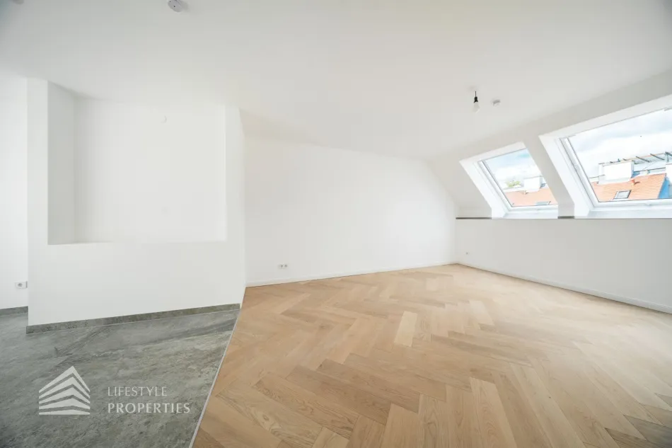 Erstbezug! Elegante 3-Zimmer Dachgeschosswohnung mit Balkon - Bild