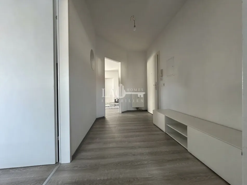 Charmante 4-Zi-Wohnung mit Balkon und Parkplatz - Bild