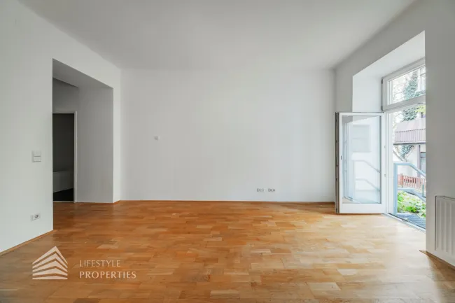 Charmante 2-Zimmer-Altbauwohnung mit idyllischem Eigengarten – urbanes Wohnen mit Rückzugsqualität - Bild