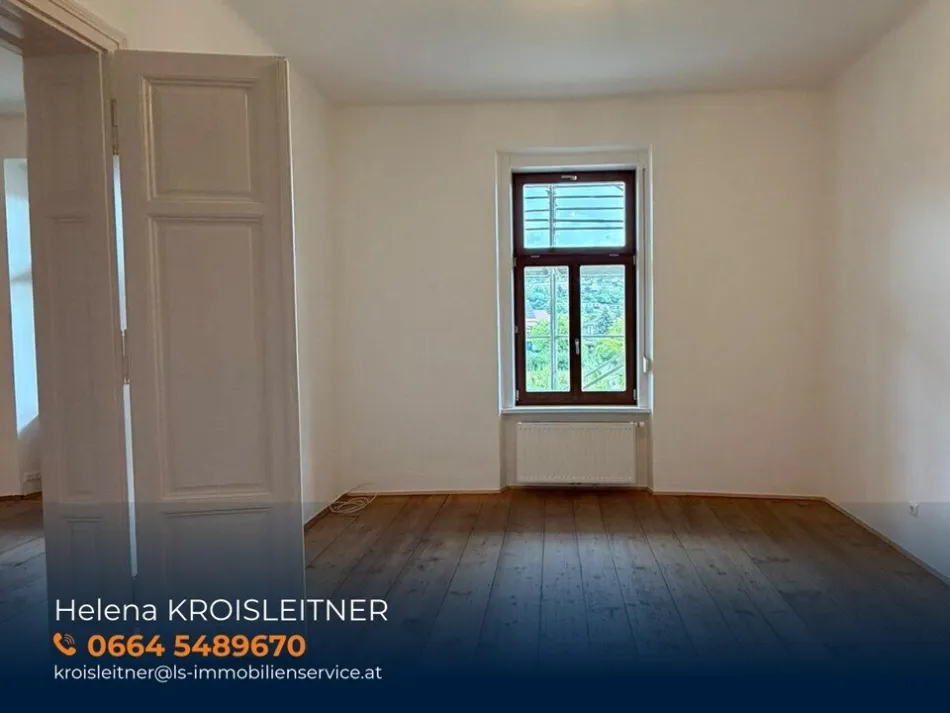 Sanierte Altbauwohnung in Pöllau! 81,5 m² im Hochparterre mit hohen Räumen, alten Holzböden und Flügeltüren - Titelbild
