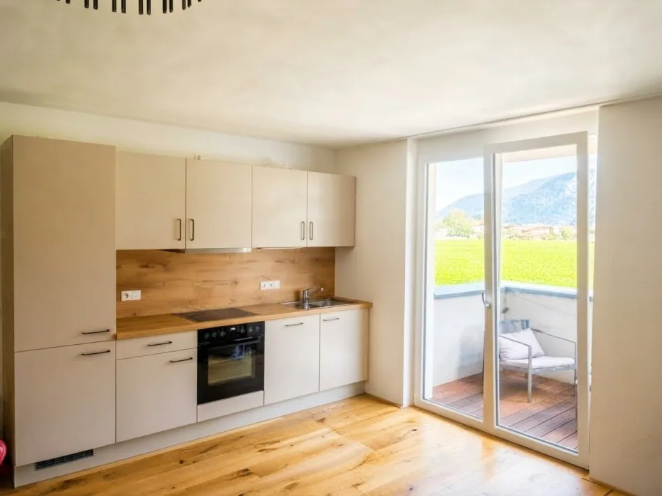 Neuwertige 2-Zimmer-Wohnung mit Terrasse & herrlichem Feldblick in Radfeld - Titelbild