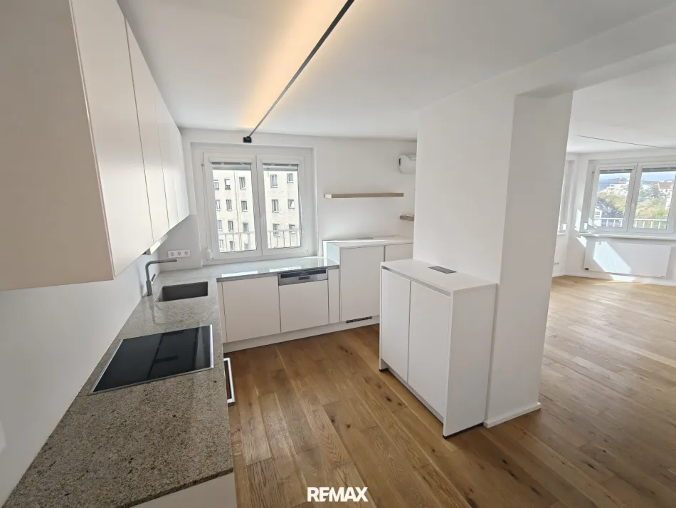 stylische 55m² Dachgeschosswohnung | 2 Zimmer | 23m² Terrasse mit Süd-West Blick | Klimaanlage & Außenjalousien - Titelbild
