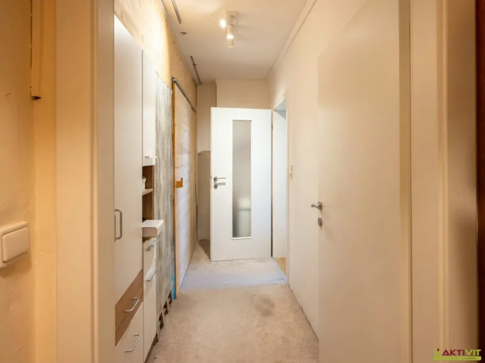 Zentral in Weiz: Gepflegte 4-Zimmer-Wohnung mit Gemeinschaftsgarten & Tiefgaragenoption - Bild