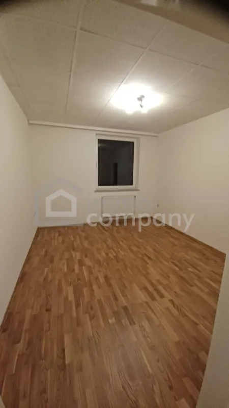 Vermietete 2-Zimmer-Eigentumswohnung mit Parkplatz und Kellerabteil - Bild