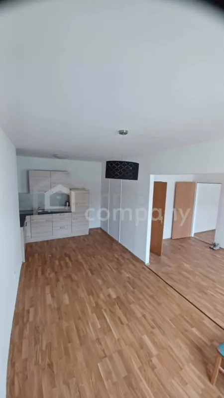 Vermietete 2-Zimmer-Eigentumswohnung mit Parkplatz und Kellerabteil - Bild