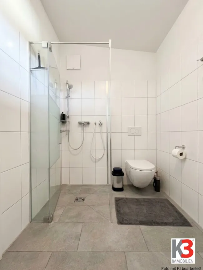 K3 - NEUWERTIGE 2-Zimmerwohnung mit ca. 23 m² großer Dachterrasse! Eigener Tiefgaragenplatz + eigener Carportplatz bereits inklusive! - Bild