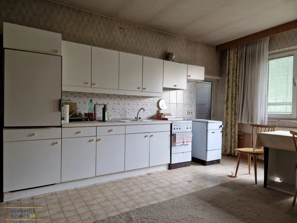Sanierungsbedürftiges Einfamilienhaus mit Entwicklungspotenzial in Hausbrunn - Bild