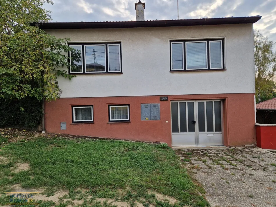 Sanierungsbedürftiges Einfamilienhaus mit Entwicklungspotenzial in Hausbrunn - Titelbild
