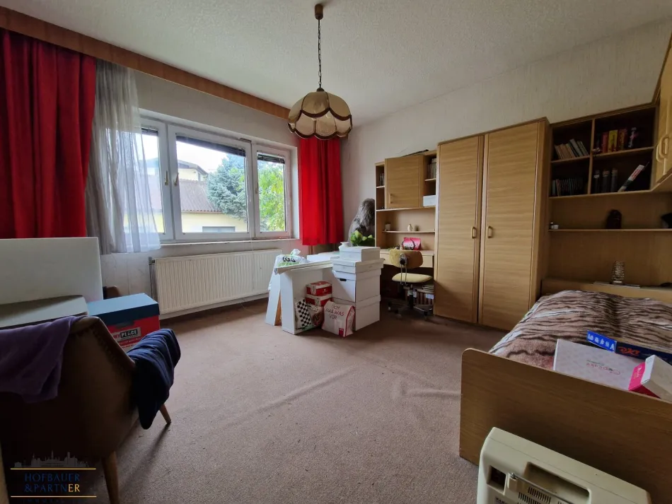 Sanierungsbedürftiges Einfamilienhaus mit Entwicklungspotenzial in Hausbrunn - Bild