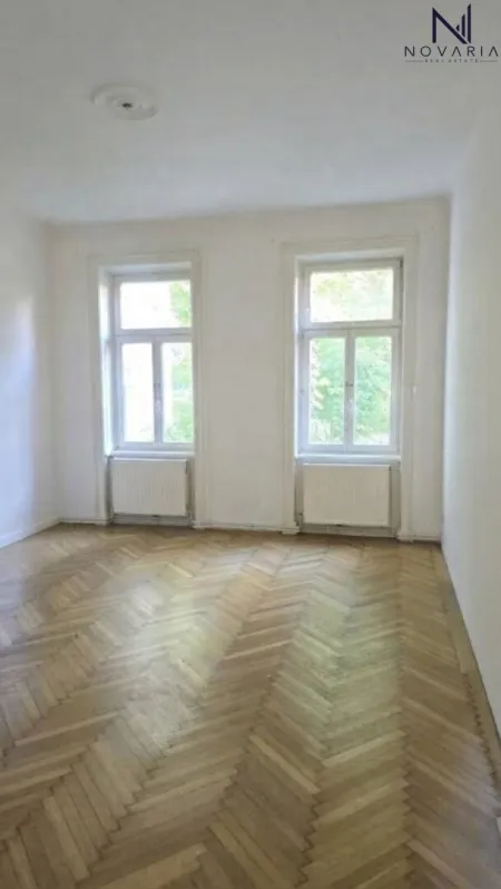Vielseitige 3-Zimmer-Wohnung mit großem Potenzial und einem bezaubernden Grünblick, die darauf wartet, von Ihnen liebevoll renoviert zu werden. (über 1.000m2 Gemeinschaftsgarten) - Titelbild