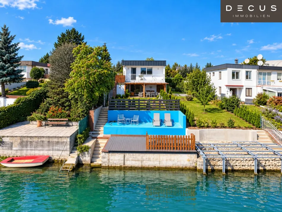 EINFAMILIENHAUS DIREKT AM WASSER | EIGENGRUND | ca. 101 m² Fläche | Eigener Garten | Renovierungsbedürftig | Großes Potenzial - Titelbild