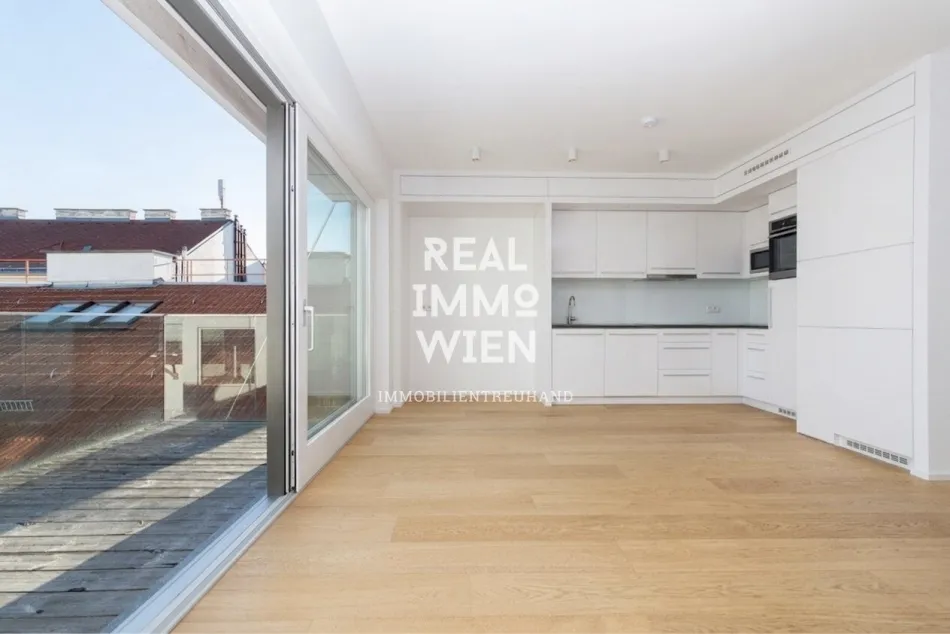 Exklusive 4-Zi-Dachgeschosswohnung mit 35 m² Terrasse & Balkon - Optional zwei Stapelgaragen-Stellplätze - Bild