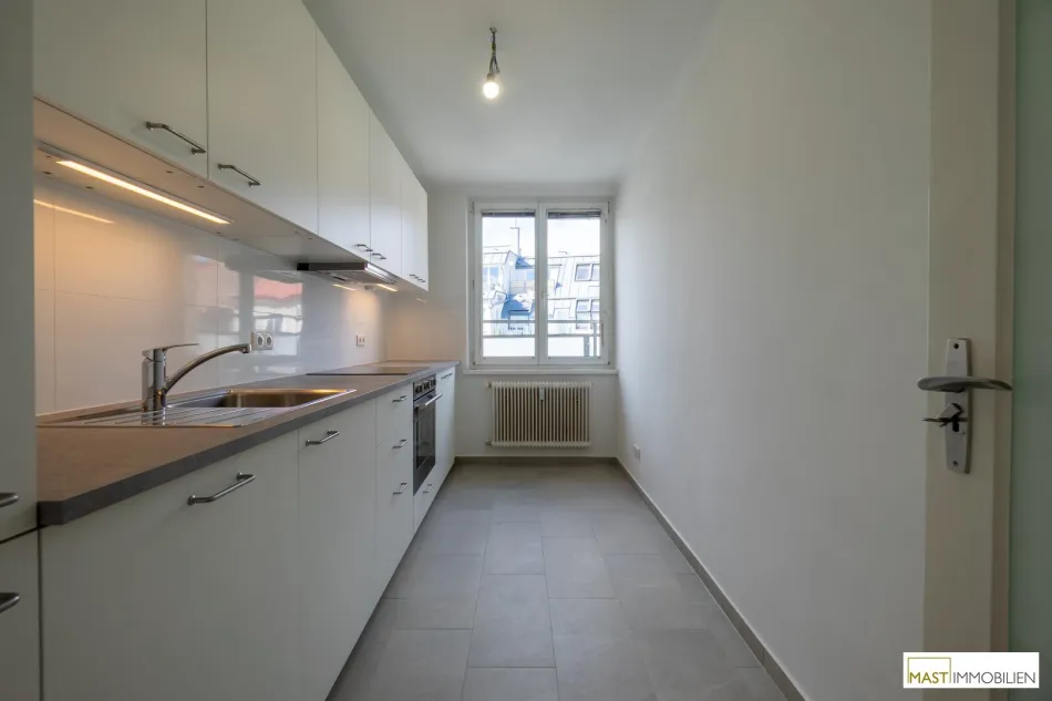 Moderne 2 Zimmer Wohnung mit hochwertiger Einbauküche und zwei Balkonen in zentraler Lage des 15. Bezirks - Bild