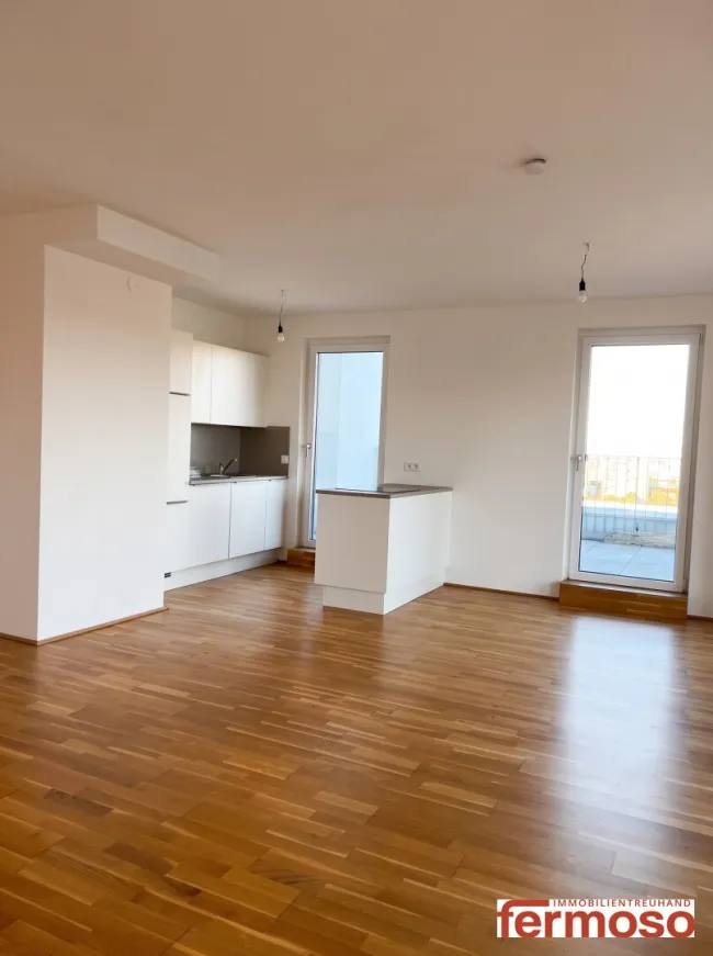 Wohnen, wo Wien durchatmet – außergewöhnliche 3-Zimmer-Terrassenwohnung am Laaerwald mit 52,3 m2 Dachterasse mit Weitblick über Wien - Bild