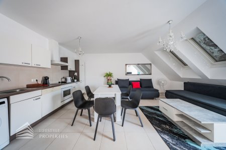 Apartmenthaus mit 16 Apartments, 21 Stellplätze und 2 Geschäftslokalen, Nähe Flughafen Wien