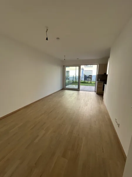 ERSTBEZUG - 2 Zimmer Gartenwohnung inkl. 2 Garagenplätze